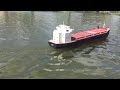 RC Ship cruising by at full speed