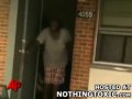 Crazy black woman attacks cameraman with hoe.flv