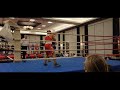 First amateur fight (loss by TKO in the 2nd round)