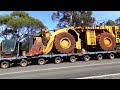 🚛. Not GNH, but GEH this time! Used wheel loader being hauled westbound on Great Eastern Highway.