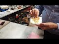 Transferring loose gold leaf onto wax paper