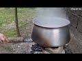 Making local buttermilk soup.wood stove