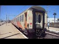 Trenes con chispazos en catenaria, Asilah (Marruecos). Sparks in train catenary, Asilah (Morocco).